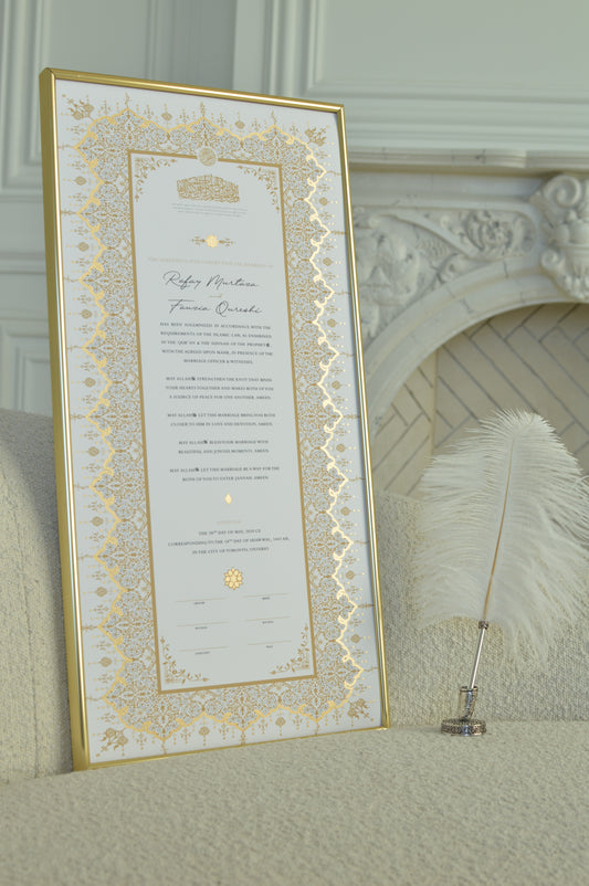 nikah certificate with hand painted gold details in gold frame with feather pen